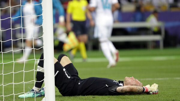 In this May 26, 2018, file photo, Liverpool goalkeeper Loris Karius reacts after Real Madrid's Gareth Bale scored during the Champions League final soccer match at the Olimpiyskiy Stadium in Kiev, Ukraine. Doctors based in Boston have concluded Karius sustained a concussion during last month’s Champions League final that would have affected his performance - Sputnik International