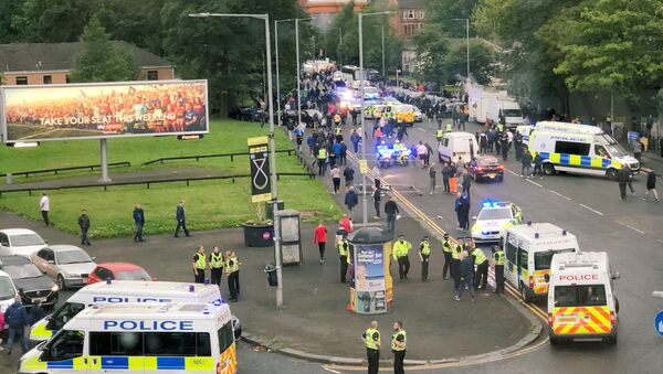 Police vehicles are seen near Ibrox Stadium due to a violence between fans during the match between Scotland's Glasgow Rangers and Croatia's NK Osijek in Glasgow, Scotland, Britain August 2, 2018, In this still image obtained from social media on August 3, 2018 - Sputnik International