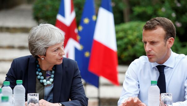 French President Emmanuel Macron meets with British Prime Minister Theresa May at the Fort de Bregancon in Bormes-les-Mimosas, France, August 3, 2018. - Sputnik International