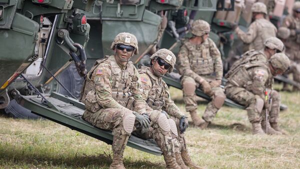 American Soldiers are seen during NATO Saber Strike military exercises on June 16, 2017 in Orzysz, Poland - Sputnik International