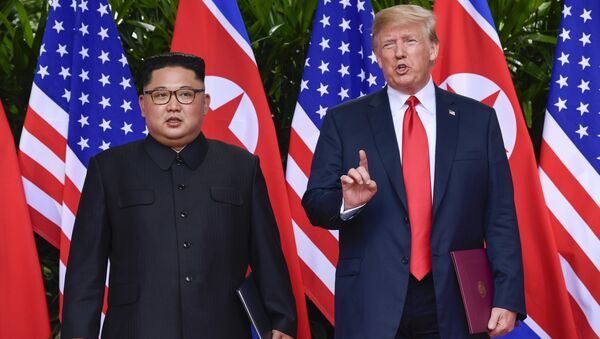 FILE - In this June 12, 2018, file photo, U.S. President Donald Trump makes a statement before saying goodbye to North Korea leader Kim Jong Un after their meetings at the Capella resort on Sentosa Island in Singapore - Sputnik International