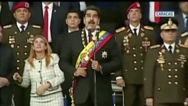 Venezuelan President Nicolas Maduro reacts during an event which was interrupted, in this still frame taken from video August 4, 2018, Caracas, Venezuela. - Sputnik International