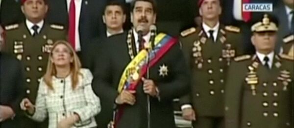 Venezuelan President Nicolas Maduro reacts during an event which was interrupted, in this still frame taken from video August 4, 2018, Caracas, Venezuela. - Sputnik International