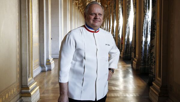 (FILES) In this file photo taken on January 14, 2016 French chef Joel Robuchon poses in a corridor in the Hotel de ville of Paris during the Grand Vermeil award ceremony, rewarding the best chefs of Paris. French chef, died at the age of 73, on August 6, 2018 according to the French government spokesperson - Sputnik International