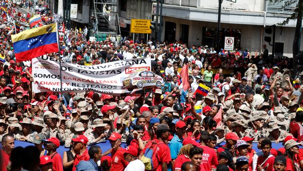 Militia members and supporters of Venezuela's President Nicolas Maduro attend a rally in support of him in Caracas, Venezuela August 6, 2018. - Sputnik International