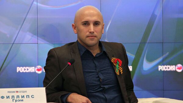 Journalist Graham Phillips at a news conference (File photo). British law enforcement detained him outside the Georgian Embassy in London. - Sputnik International