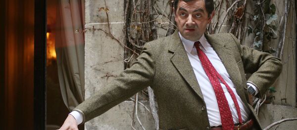 British actor Rowan Atkinson poses during a photocall at the presentation of his last movie 'Mr. Bean's Holiday', 11 April 2007 in Paris. The movie will be released in France the 18 April 2007. - Sputnik International