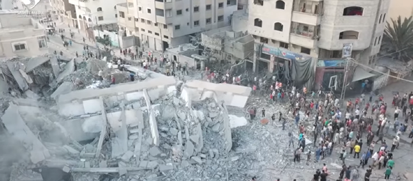 Israel bombed the Said al-Mishal Cultural Center on Thursday in what the country said was retaliation over rocket fire from Gaza before before reaching a ceasefire with Hamas later that night. - Sputnik International