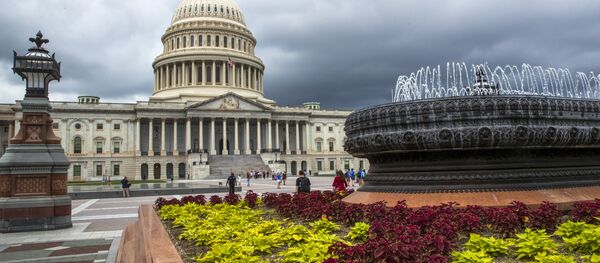 East Front of the U.S. Capitol in Washington is seen under stormy skies - Sputnik International