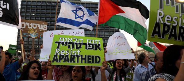 Israeli Arabs and their supporters take part in a rally to protest against Jewish nation-state law in Rabin square in Tel Aviv Israeli Arabs and their supporters take part in a rally to protest against Jewish nation-state law in Rabin square in Tel Aviv - Sputnik International