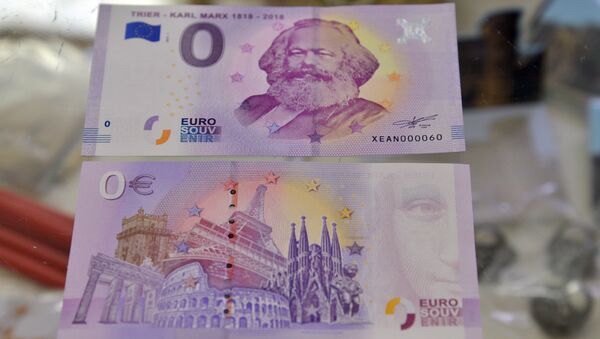 This picture taken on April, 10, 2018 in Trier, southwestern Germany, shows the front and the back side of a Zero-Euro-bank note realeased on the occasion of German philosopher Karl Marx's bicentenary - Sputnik International