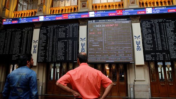 Electronic boards are seen at the Madrid stock exchange which plummeted after Britain voted to leave the European Union in the EU BREXIT referendum, in Madrid, Spain, June 24, 2016. - Sputnik International