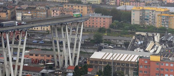 The collapsed Morandi Bridge is seen in the Italian port city of Genoa August 14, 2018 The collapsed Morandi Bridge is seen in the Italian port city of Genoa August 14, 2018 - Sputnik International