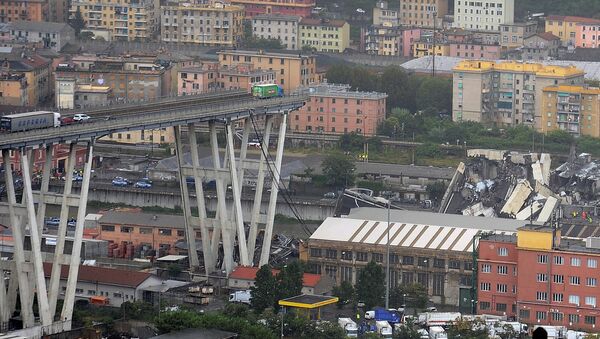 The collapsed Morandi Bridge is seen in the Italian port city of Genoa August 14, 2018 - Sputnik International