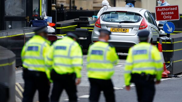 Forensic investigators work at the site after a car crashed outside the Houses of Parliament in Westminster, London, Britain, August 14, 2018 - Sputnik International