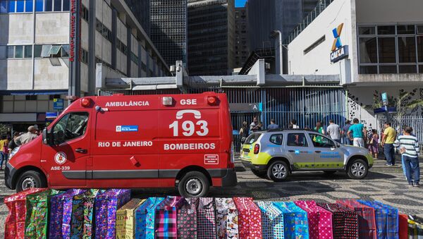 An ambulance of the fire department is seen outside the Carioca station where a man was rescued after falling onto the tracks of the Rio de Janeiro - Sputnik International