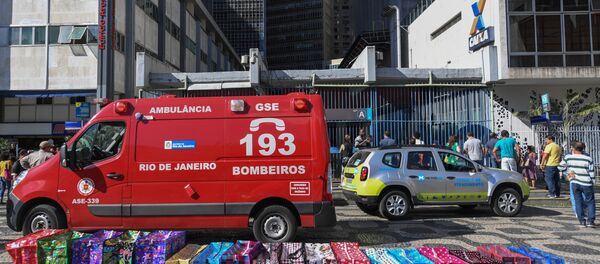 An ambulance of the fire department is seen outside the Carioca station where a man was rescued after falling onto the tracks of the Rio de Janeiro - Sputnik International
