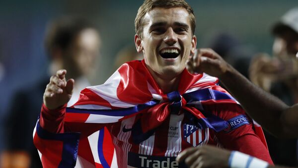 Atletico's Antoine Griezmann celebrates after winning the UEFA Super Cup final soccer match between Real Madrid and Atletico Madrid at the Lillekula Stadium in Tallinn, Estonia, Wednesday, Aug. 15, 2018 - Sputnik International