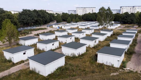 In this Aug. 16, 2018 photo houses originally built for refugees sit on the site of a former refugee center in Hamburg, Germany - Sputnik International