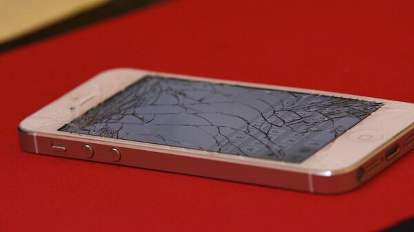 Broken iPhone - Sputnik International
