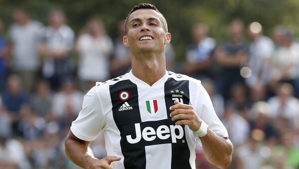 Juventus' Cristiano Ronaldo smiles during a friendly soccer match between the Juventus A and B teams, in Villar Perosa, near Turin, Italy, Sunday, Aug.12, 2018 - Sputnik International