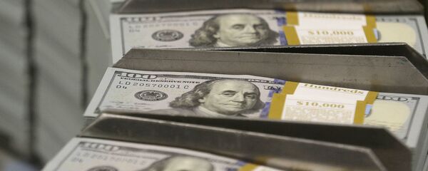 Stacks of $100 bills at the Bureau of Engraving and Printing Western Currency Facility in Fort Worth, Texas - Sputnik International