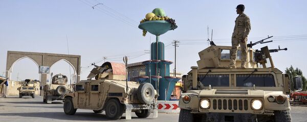 Aug. 12, 2018, photo, Afghan security personnel patrol in the city of Ghazni province west of Kabul, Afghanistan. A Taliban assault on Ghazni, a key city linking areas of Taliban influence barely 75 miles from Kabul, has killed about 100 Afghan policemen and soldiers since Friday, the Afghan Defense Ministry said - Sputnik International