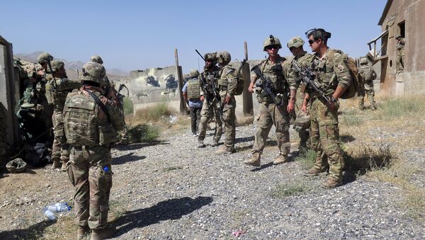 U.S. military advisers from the 1st Security Force Assistance Brigade are seen at an Afghan National Army base in Maidan Wardak province, Afghanistan August 6, 2018 - Sputnik International