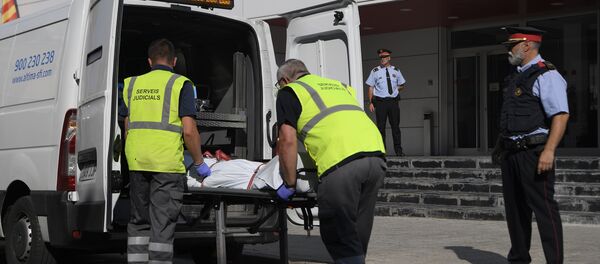 The body of a man who tried to attack a police station is carried out of the premises in Cornella near the northeastern Spanish city of Barcelona on August 20, 2018 The body of a man who tried to attack a police station is carried out of the premises in Cornella near the northeastern Spanish city of Barcelona on August 20, 2018 - Sputnik International