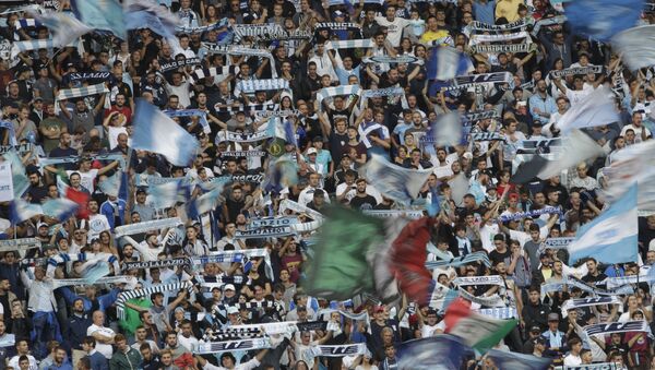 Lazio fans cheer prior to a Serie A soccer match between Lazio and AC Milan, at the Rome Olympic stadium, Sunday, Sept. 10, 2017 - Sputnik International