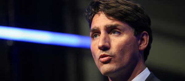 Canada's Prime Minister Justin Trudeau answers questions from the media in Montreal, Quebec, Canada, August 8, 2018 Canada's Prime Minister Justin Trudeau answers questions from the media in Montreal, Quebec, Canada, August 8, 2018 - Sputnik International