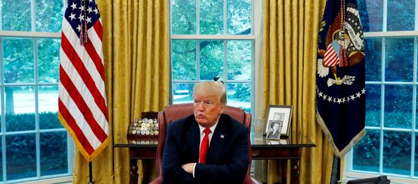 U.S. President Donald Trump reacts to a question during an interview with Reuters in the Oval Office of the White House in Washington, U.S. August 20, 2018 U.S. President Donald Trump reacts to a question during an interview with Reuters in the Oval Office of the White House in Washington, U.S. August 20, 2018 - Sputnik International