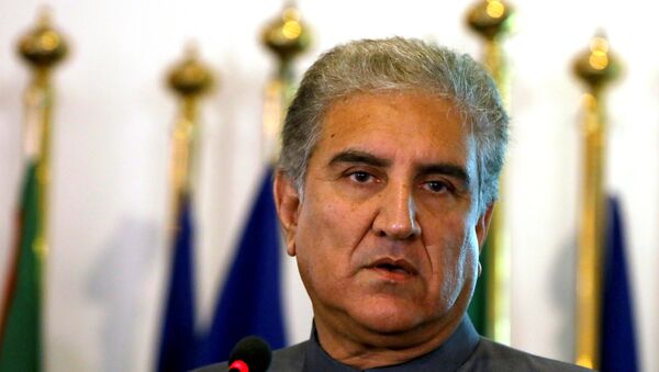Pakistan's new Foreign Minister Shah Mehmood Qureshi listens during a news conference at the Foreign Ministry in Islamabad, Pakistan August 20, 2018 - Sputnik International