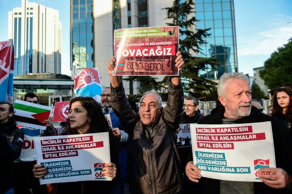 Leftist protesters chant slogans against the US and Israel as they hold placards reading US airbase in Incirlik should close - Cut all relations with Israel- USA get out of our country and the Middle East on December 9, 2017 Leftist protesters chant slogans against the US and Israel as they hold placards reading US airbase in Incirlik should close - Cut all relations with Israel- USA get out of our country and the Middle East on December 9, 2017 - Sputnik International