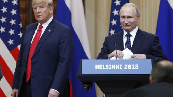 In this July 16, 2018, file photo, U.S. President Donald Trump, left, and Russian President Vladimir Putin arrive for a press conference after their meeting at the Presidential Palace in Helsinki, Finland. If Donald Trump is serious about his public courtship of Vladimir Putin, he may want to take pointers from one of the Russian leader's longtime suitors: Chinese President Xi Jinping. In this political love triangle, Putin and Xi are tied by strategic need and a rare dose of personal affection, while Trump's effusive display in Helsinki showed him as an earnest admirer of the man leading a country long considered America's adversary - Sputnik International