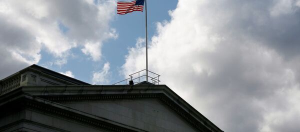 The United States flag flies atop the U.S. Treasury Department in Washington November 18, 2008 The United States flag flies atop the U.S. Treasury Department in Washington November 18, 2008 - Sputnik International