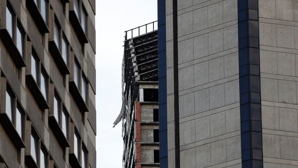 Structural damage is seen on the top five floors of an abandoned 45-storey skyscraper known as the Tower of David after an earthquake in Caracas, Venezuela August 21, 2018 - Sputnik International