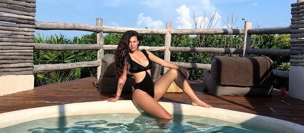 Michelle Carvalho - Sputnik International