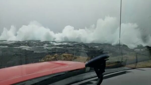 Waves crash on the coast as Hurricane Lane approaches Ka'u, Hawaii, U.S. August 22 2018, in this still image obtained from a social media video. Video taken from inside a vehicle. Courtesy of Ken Boyer - Sputnik International