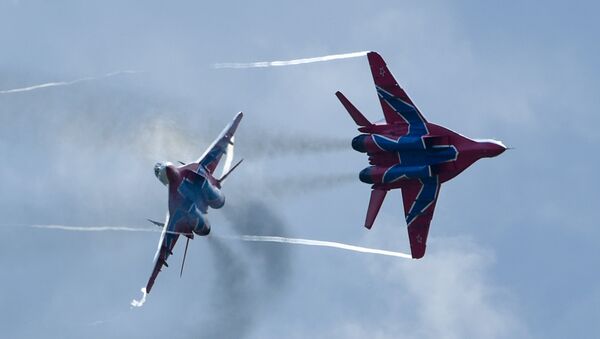 MiG-29 jet fighters of Russian aerobatic team Strizhi (Swifts) at the 4th international military technical forum Army 2018 - Sputnik International