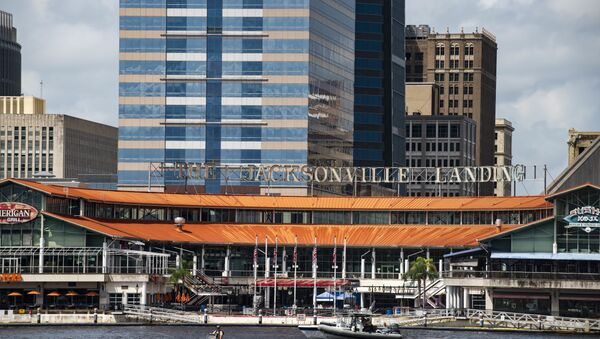 The coast guard patrols the St John's river outside of the Jacksonville Landing in Jacksonville, Fla., Sunday, Aug. 26, 2018. Florida authorities are reporting multiple fatalities after a mass shooting at the riverfront mall in Jacksonville that was hosting a video game tournament - Sputnik International