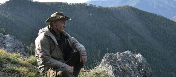 26 August, 2018. Russian President Vladimir Putin on a vacation in the Republic of Tuva - Sputnik International