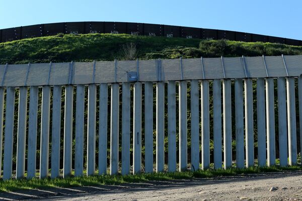 The border wall separating the United States and Mexico is pictured in San Ysidro, California. The border wall separating the United States and Mexico is pictured in San Ysidro, California. - Sputnik International