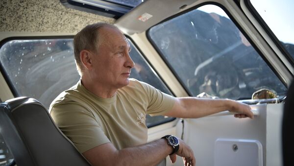26 August, 2018. Russian President Vladimir Putin during his vacation in the Republic of Tyva - Sputnik International