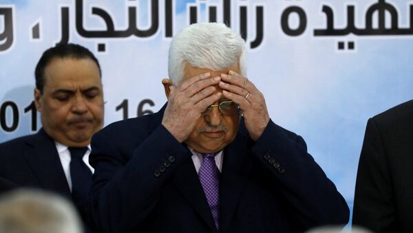 Palestinian President Mahmoud Abbas prays at the opening of the Palestinian Central Council meeting, in Ramallah, in the occupied West Bank August 15, 2018 - Sputnik International