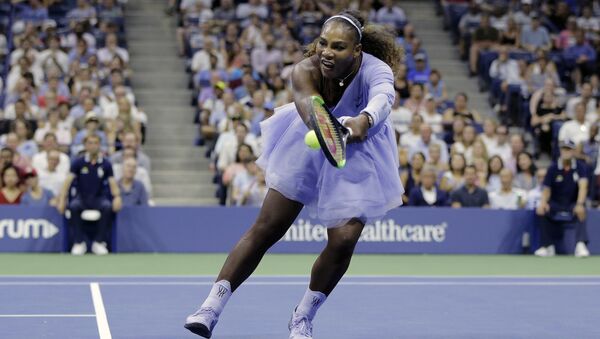 Serena Williams returns a shot to Carina Witthoeft, of Germany, during the second round of the U.S. Open tennis tournament, Wednesday, Aug. 29, 2018, in New York. - Sputnik International