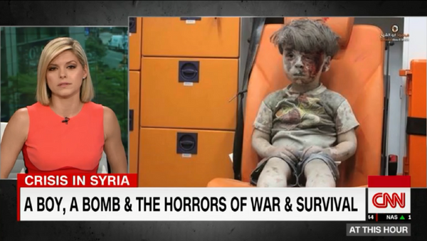 CNN anchor Kate Bolduan chokes up after Omran Daqneesh, 5, was injured in an alleged airstrike. The boy's father came out in support of Assad and criticized rebel groups for using his son's image as propaganda in June 2017. - Sputnik International