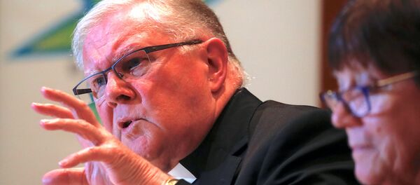 Archbishop Mark Coleridge, President of the Australian Catholic Bishops Conference in Australia, speaks as Sister Monica Cavanagh, President of Catholic Religious Australia, listens during a media conference in Sydney, Australia, August 31, 2018 Archbishop Mark Coleridge, President of the Australian Catholic Bishops Conference in Australia, speaks as Sister Monica Cavanagh, President of Catholic Religious Australia, listens during a media conference in Sydney, Australia, August 31, 2018 - Sputnik International