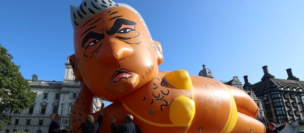 Demonstrators launch a giant bikini-clad blimp of London Mayor Sadiq Khan over Parliament Square in Westminster London, Britain, September 1, 2018. Demonstrators launch a giant bikini-clad blimp of London Mayor Sadiq Khan over Parliament Square in Westminster London, Britain, September 1, 2018. - Sputnik International