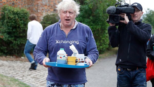 Britain's former Foreign Secretary Boris Johnson stands outside his home near Thame in Oxfordshire, August 12, 2018. - Sputnik International